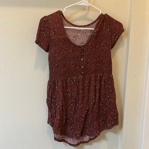 Red shirt sleeve blouse with white flowers